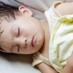 Por que meu filho soa tanto quando dorme?